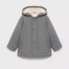 Hooded coat with shearling-effect lining